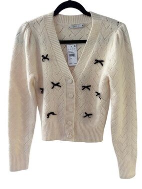 Lush Cream V-Neck Cardigan with Black Bow Accents